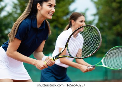 Fit Happy Poeple Playing Tennis Together. Sport Concept