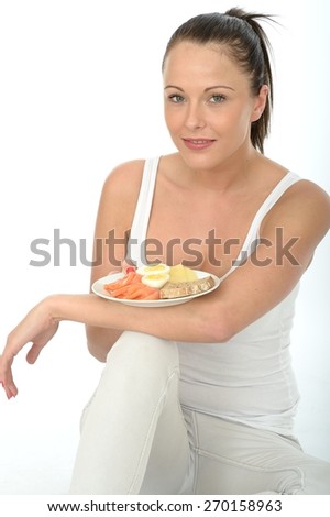 Fit Happy Young Brunette Caucasian Woman, Holding A Plate Of A Typical Scandinavian Style Low Fat And Healthy Breakfast, Alone And Isolated On White, Smoked Salmon, Boiled Eggs, Bread And Cheese