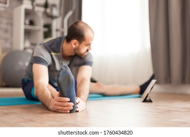 Fit Male Stretching His Body Watching Stock Photo 1760434820 | Shutterstock