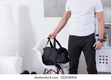 Fit Man With Gym Bag Going On The Workout