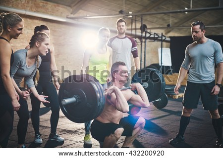 Similar – Foto Bild Langhantel mit Gewichten in einem Fitnessstudio