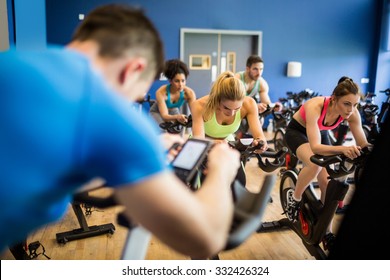 Fit People In A Spin Class At The Gym