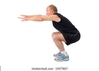 Fit Senior Man Doing A Squat