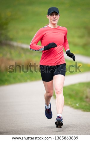 Similar – Blick auf den älteren Mann, der durch den Park joggt.