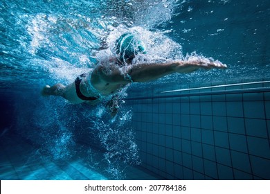 Fit Swimmer Training By Himself In The Swimming Pool At The Leisure Centre