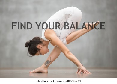 Fit woman with beautiful tattoo working out doing yoga or pilates exercise. Fitness motivation quote with motivational text "find your balance". Healthy lifestyle concept