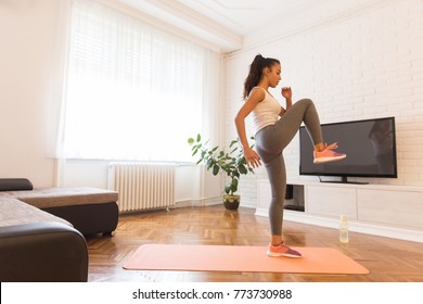 Fit Woman Exsercise In The Room At Home