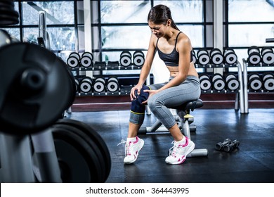 Fit Woman Having Knees Pain At Gym