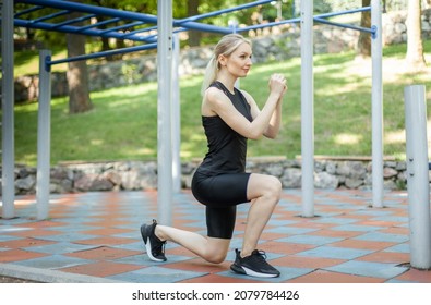 Fit Woman Practices Lunges On The Workout Site. Healthy Lifestyle Concept. Outdoor Workout