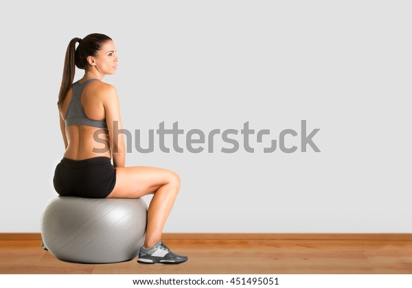 sitting on yoga ball