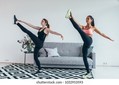 Fit Woman Stretching Legs Warming Up Workout At Home