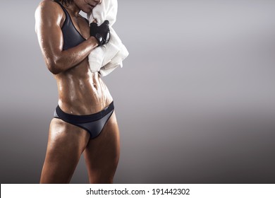 Fit Woman Sweating Finishing The Exercise