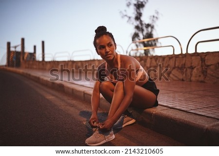 Similar – Image, Stock Photo Woman at dusk on the beach