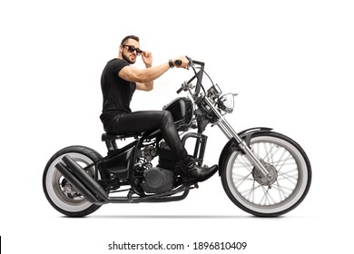 Fit Young Man Riding A Chopper Motorbike Isolated On White Background