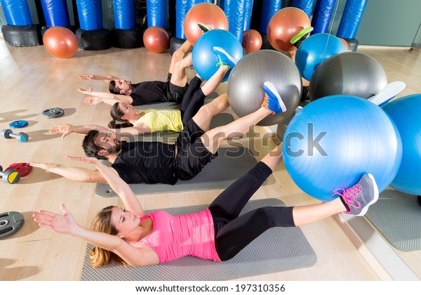 Fitball crunch training group core fitness at gym
abdominal workout