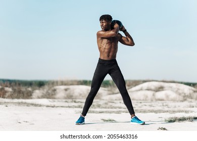 Fitness African American Man Doing Workout Twist Exercise With Medicine Ball Weight, Outdoors In Nature, Athlete Doing Langs And Torso Rotation For Abs Workout
