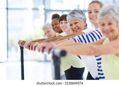 Fitness For All Ages. Shot Of A Group Of Women Working Out Indoors.