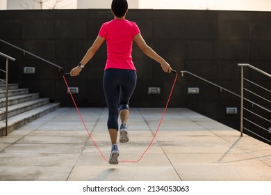 Fitness Asian Woman Jumping Rope