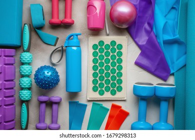 Fitness background. Equipment for gym and home. Top view. Flat lay - Shutterstock ID 1679298313
