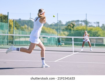 Fitness, balance and sport with woman tennis players practice competitive match at a sport court. Professional athlete workout at a game or competition. Lady training sports together with partner - Powered by Shutterstock