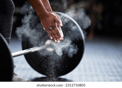 Fitness, barbell or hands of bodybuilder with chalk in workout or exercise for strength training. Deadlift, powerlifting closeup or sports athlete weightlifting with powder or dust on gym floor - Powered by Shutterstock