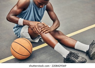 Fitness, basketball knee injury or pain while on basketball court holding leg in exercise, training or sport workout. Professional athlete, health or sports man with accident in street game or event - Shutterstock ID 2208429369