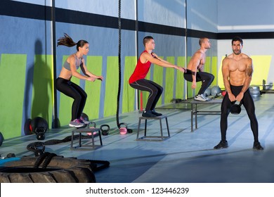 Fitness Box Jump People Group And Kettlebell Man At Gym