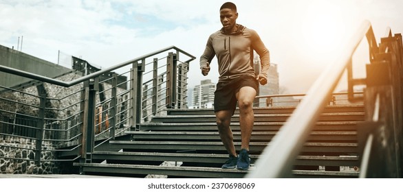 Fitness, city and black man running on steps outdoor, exercise and training healthy body in the morning. Sports, cardio and African athlete on stairs for endurance workout, energy or jog for wellness - Powered by Shutterstock