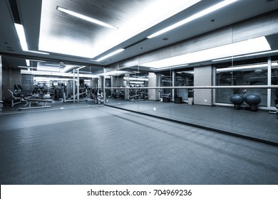 Fitness club in luxury hotel interior, GYM concept as background.