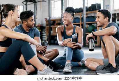 Fitness, conversation and friends at the gym for training, exercise motivation and relax after cardio. Laughing, happy and people with a group discussion about a workout, health class and performance - Powered by Shutterstock