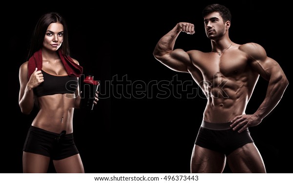 Fitness couple on a black background gym wall mural