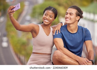 Fitness, couple and selfie, exercise and smartphone, outdoor in urban street and interracial, after workout photograph, smile. Phone photography, happy and wellness with man and black woman athlete. - Shutterstock ID 2240460309