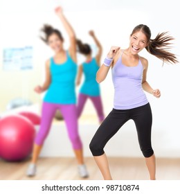 Fitness Dance Studio Class. Dancing Woman In Gym During Exercise Dancer Workout Training With Happy Fresh Energy.