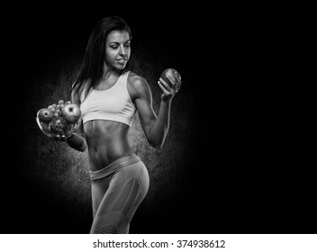 Fitness and diet. Smiling young woman.