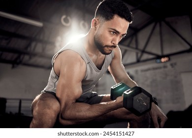 Fitness, dumbbell or strong man training, exercise or workout for powerful arms or muscles at gym. Concentration curls, strength or serious Arab athlete lifting weights or exercising biceps in Dubai - Powered by Shutterstock