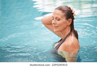 Fitness, exercise and senior woman in a swimming pool, happiness and stress relief with fun. Human, mature female person and lady with joy, training and relax with water sports, workout and chilling - Powered by Shutterstock