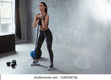 Fitness Exercise. Sports Woman Exercising With Resistance Band