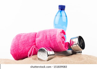 fitness gear on beach sand - Powered by Shutterstock