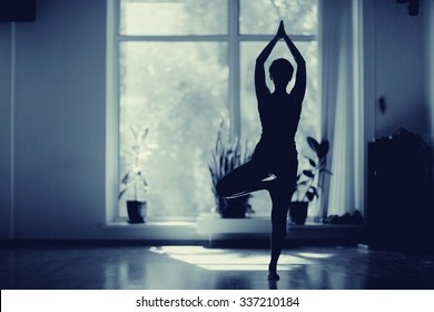 Fitness Girl Yoga Silhouette In The Room