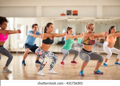 
Fitness Group Doing Exercises For Shaping Breech On Fitness Class