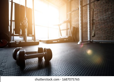 Fitness gym background with sports equipment for workout