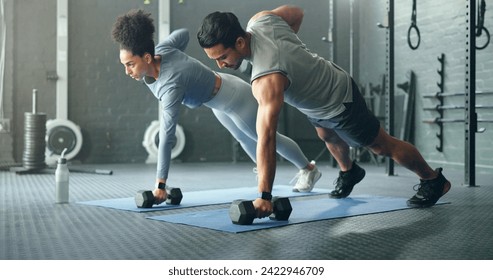 Fitness, gym and couple plank with weight dumbbell for workout, strength and training lifestyle. Exercise, wellness and health of interracial people weightlifting for strong abdomen muscles. - Powered by Shutterstock