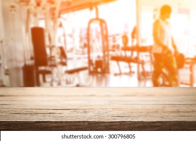 Fitness Gym And Wooden Desk Space