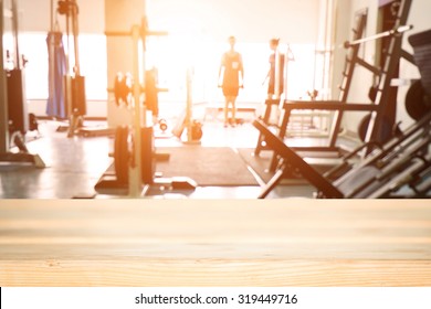 fitness gym and wooden desk space - Shutterstock ID 319449716