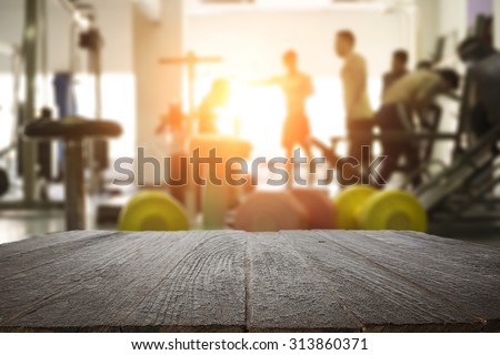 fitness gym and wooden table space