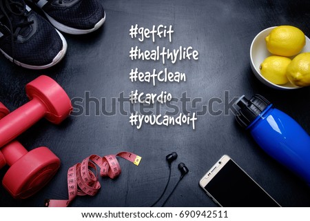 Fitness hashtag #getfit, #healthylife, #eatclean #cardio #youcandoit. Health fitness concept