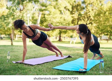 Fitness, high five and push up with women in park together for outdoor motivation or success. Exercise, support and training with friends on grass for competition, physical improvement or workout - Powered by Shutterstock