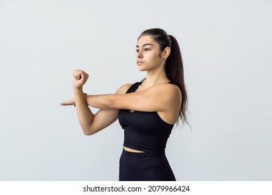 Fitness, Home And Diet Concept - Smiling Young Woman Streching Hands At Home