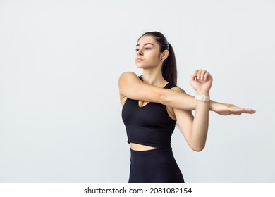 Fitness, Home And Diet Concept - Smiling Young Woman Streching Hands At Home