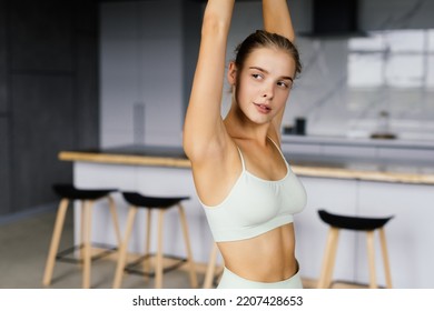 Fitness, Home And Diet Concept - Smiling Teenage Girl Streching At Home